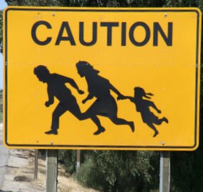 Caution-Illegal-Immigrants-Crossing